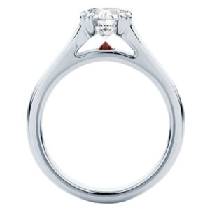 Engagement ring with hidden stone outlet