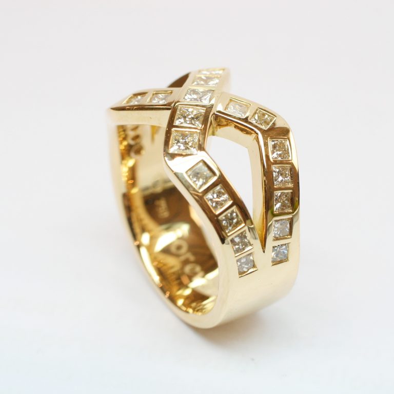 Crossover Design Dress Ring in Yellow Gold Featuring Gypsy Set Princess Cut Diamonds