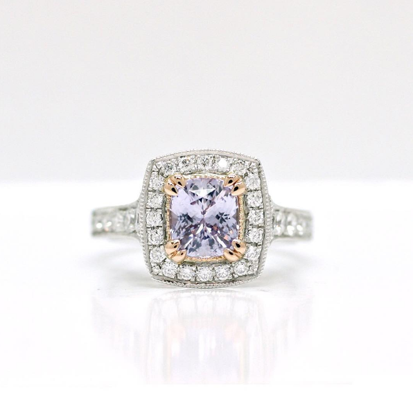 Cushion Cut Lilac Sapphire Set in a Rose and White Gold Diamond Halo Design