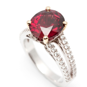 Oval Cut Red Spinel in a Diamond Set Split Band Design