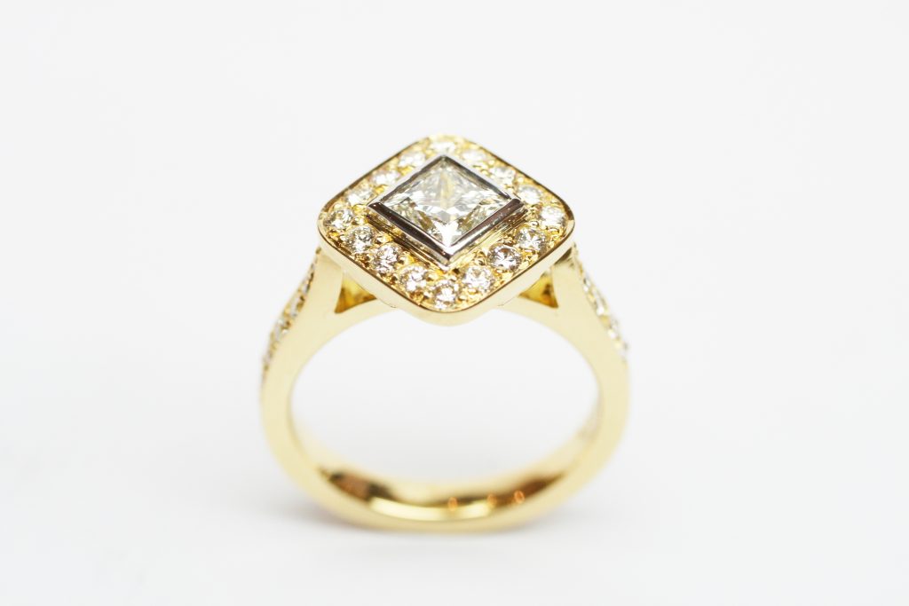 Diagonal Set Princess Cut Diamond Halo Design Ring in Yellow Gold