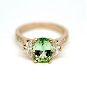 Oval Green Tourmaline with Half Moon Cut Diamonds and a Rose Gold Diamond Set Band