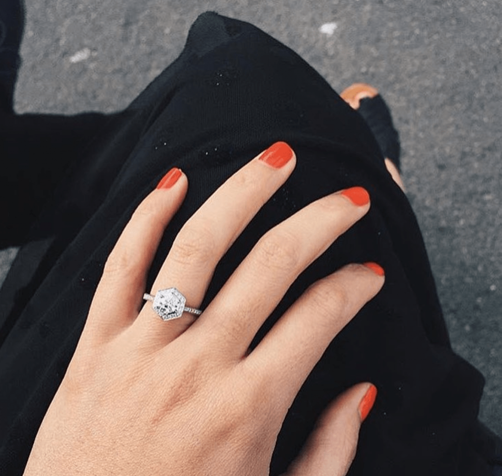 Traditional engagement ring on bride hand 13802415 Stock Photo at Vecteezy