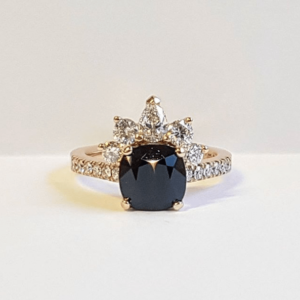 Cushion Cut Black Spinel with a Pear Shaped Diamond Partial Halo in Yellow Gold