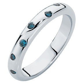 The Gypsy Blue ladies wedding ring featuring eight blue diamonds.