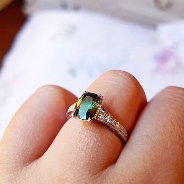 Cushion Cut Green Sapphire Ring with Grain Set Diamond Shoulders and Hand Engraving