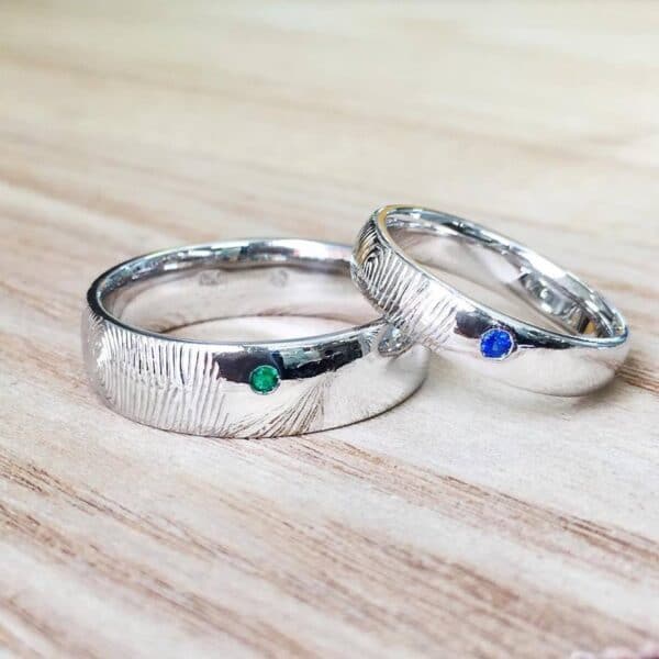 Custom White Gold Wedding Rings Featuring Fingerprint Engraving and Birthstones