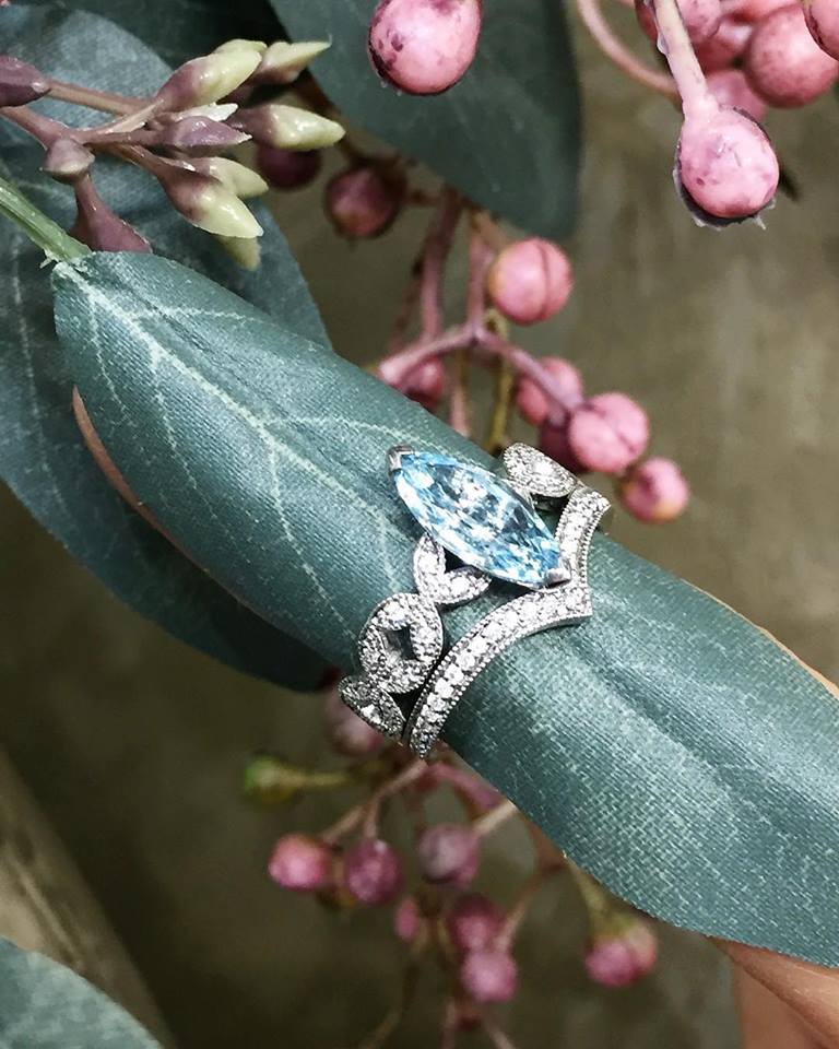 aquamarine coloured stone engagement ring