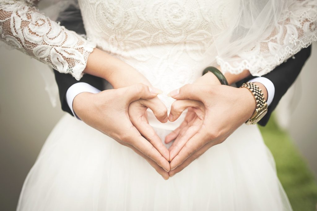 couple wearing bracelets