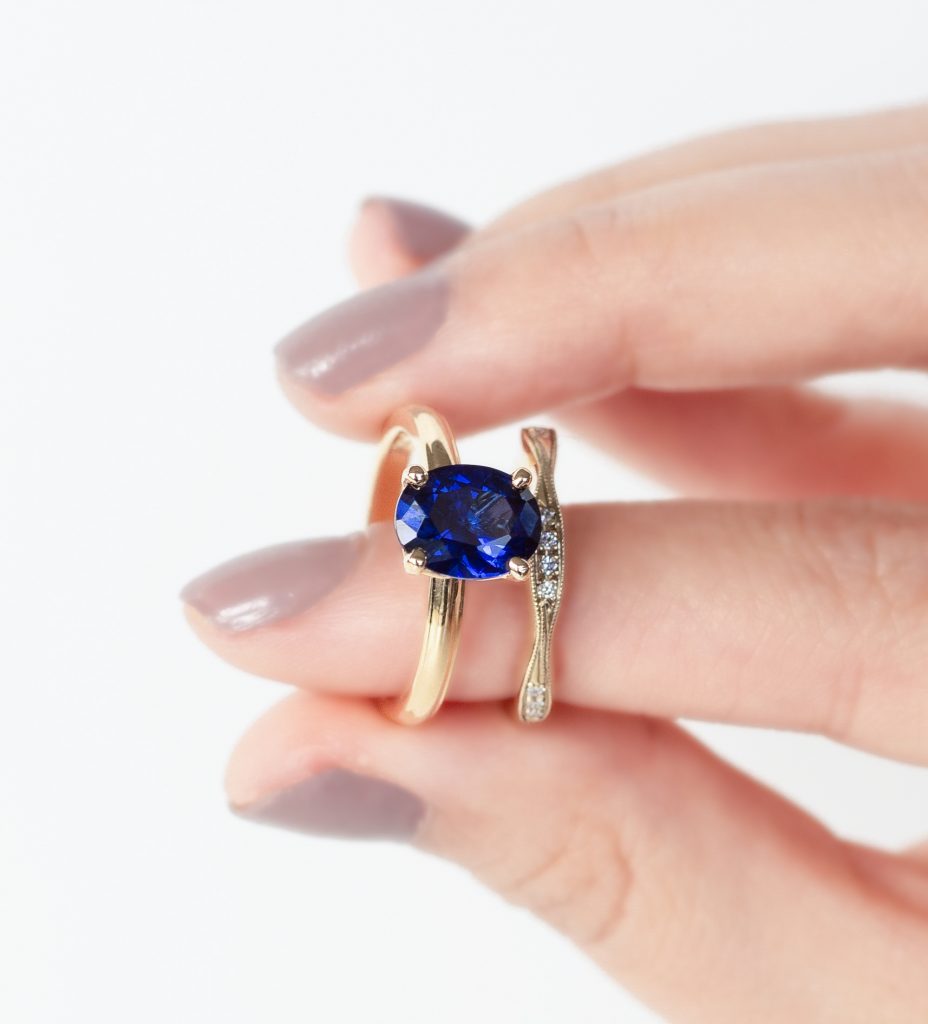 Oval Ceylon Sapphire in a Delicate Mill Grain Solitaire Design with a Twist Style Diamond Wedding Ring