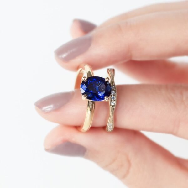 Oval Ceylon Sapphire in a Delicate Mill Grain Solitaire Design with a Twist Style Diamond Wedding Ring