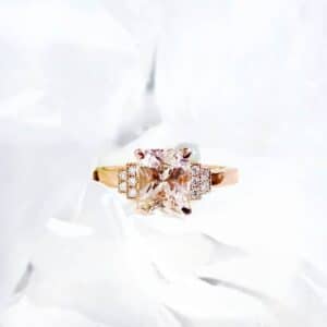 Radiant Cut Peach Sapphire in an Art Deco Inspired Rose gold and Diamond Ring