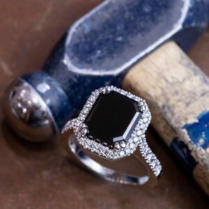Emerald Cut Black Sapphire in a Diamond and White Gold Halo Design Ring