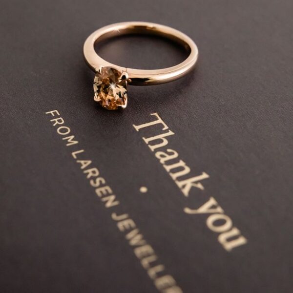 Oval Champagne Diamond Claw Set in a Rose Gold Solitaire Ring