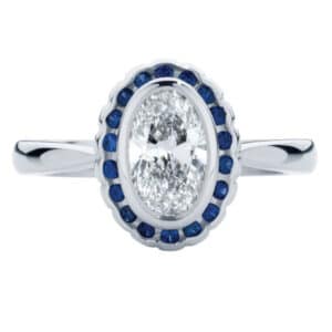 Oval Diamond Surrounded By a Ceylon Sapphire Halo in White Gold