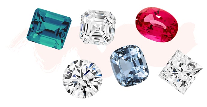 A collection of diamonds and coloured gemstones such as sapphired and rubies