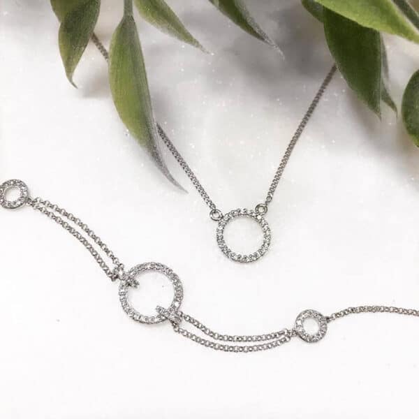 Matching diamond and white gold necklace and bracelet.