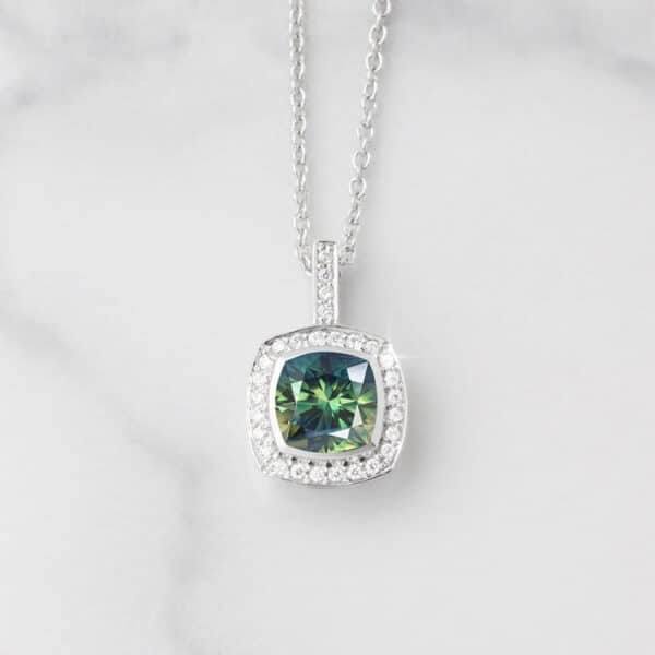 Australian Parti sapphire pendant with a diamond halo in white gold