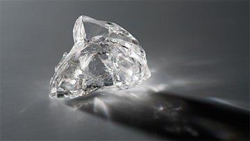 An uncut natural diamond, also knows as a rough diamond