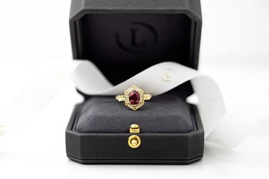 A custom designed and made Ruby Dress ring in a Larsen Jewellery ring box