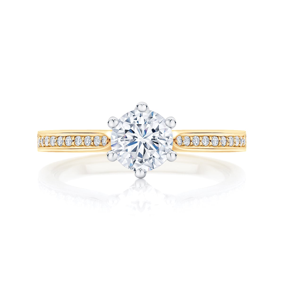 Round diamond engagement ring yellow gold with side stones