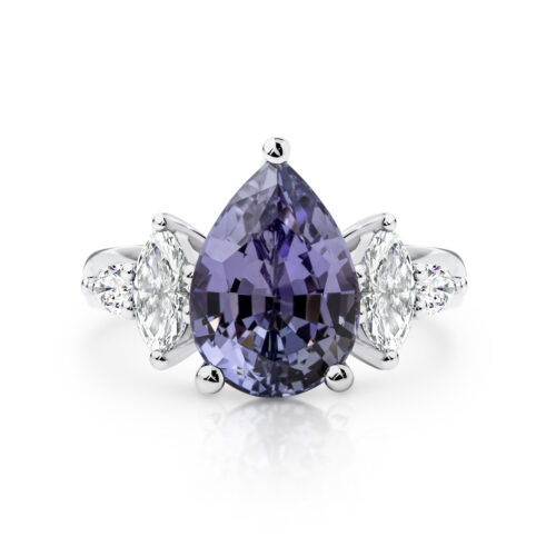 The Bachelor Engagement Ring from 2020, a pear tanzanite engagement ring with diamond side stones.