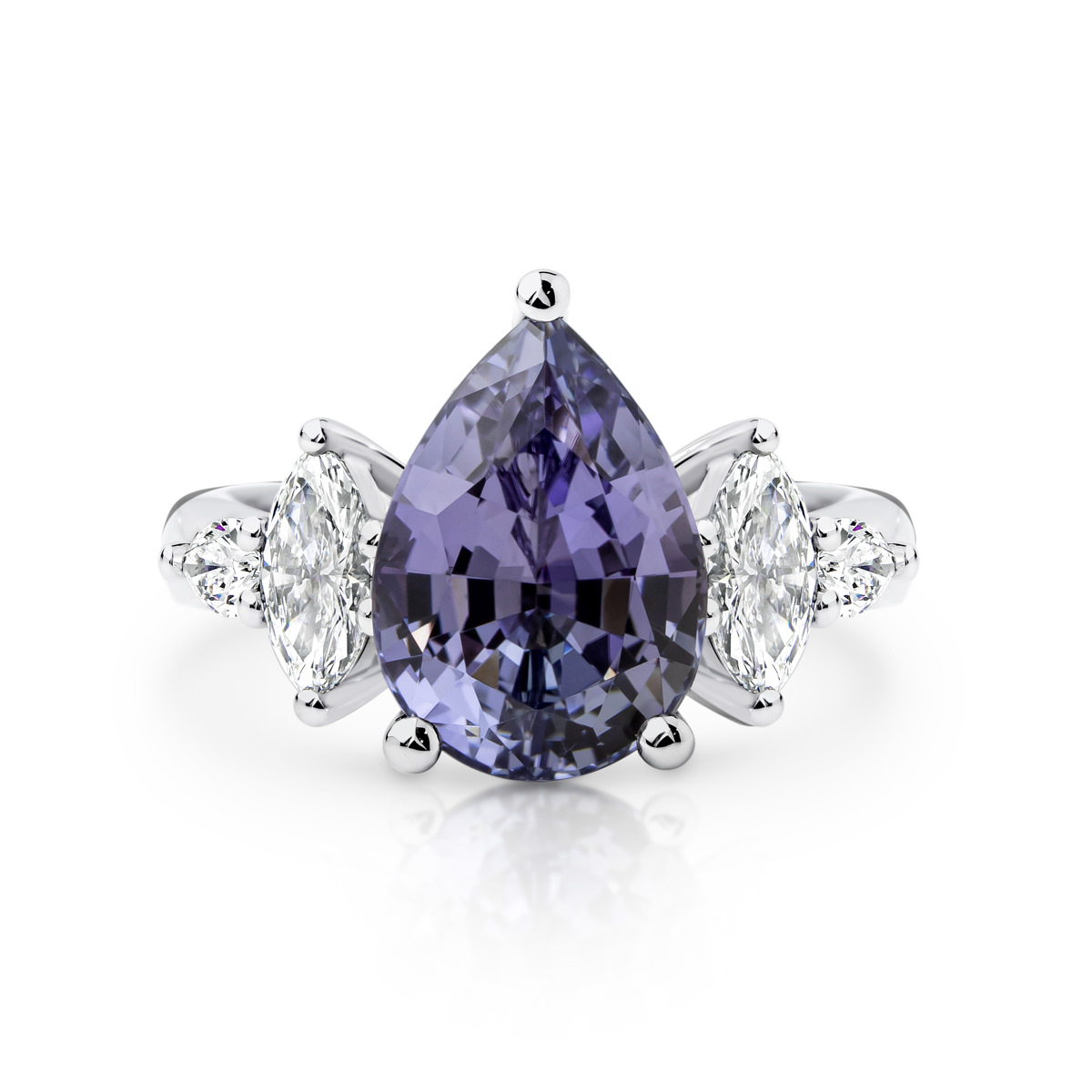 The Bachelor Engagement Ring from 2020, a pear tanzanite engagement ring with diamond side stones.