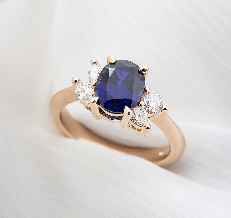 Asymmetrical rose gold sapphire ring