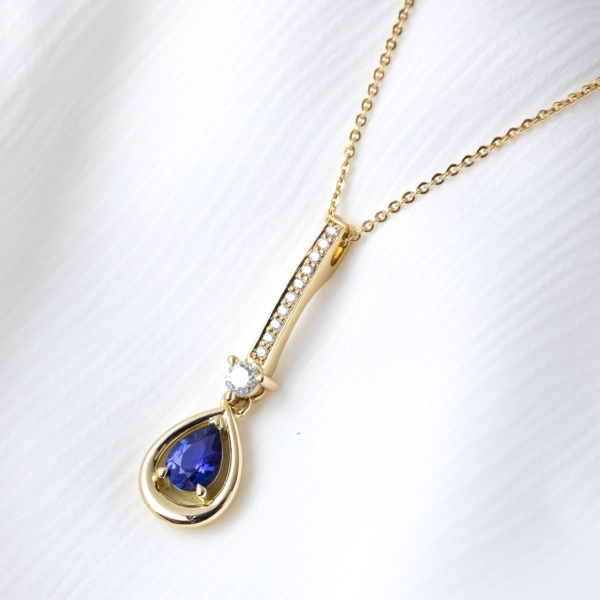 Pear Shaped Sapphire and Diamond Pendant in Yellow Gold