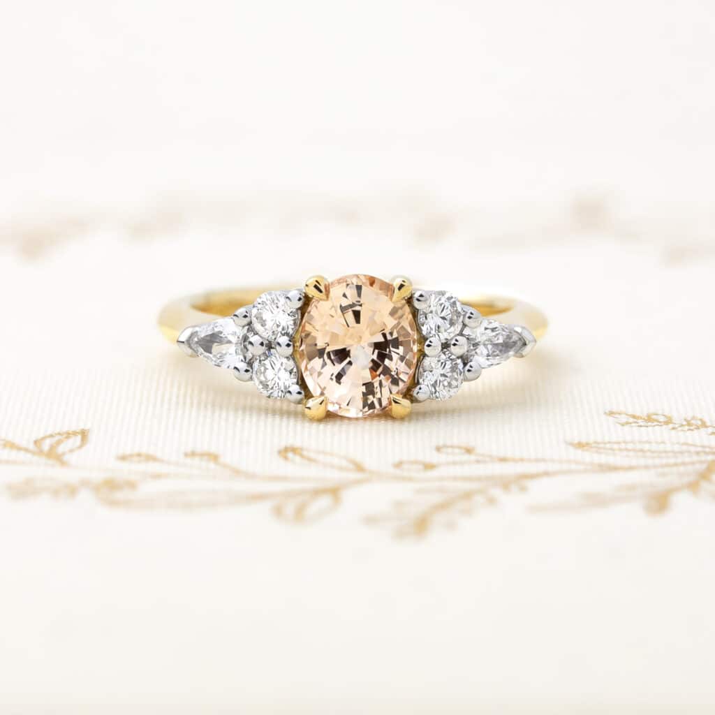 Oval Peach Sapphire Engagement Ring with Diamond Side Stones