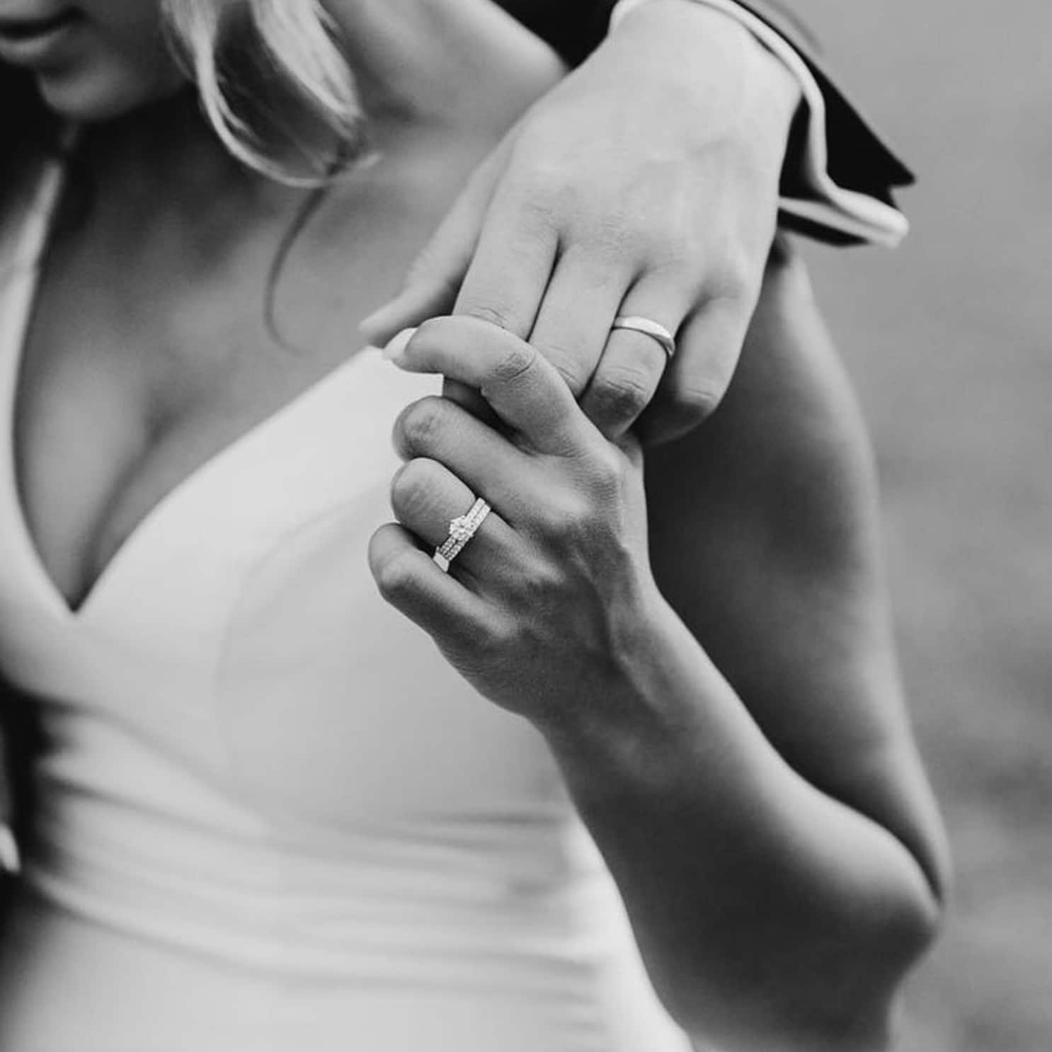 Illustration of Male hands placing an Engagement Ring on the Ring Finger of  the Female Hand Stock Photo - Alamy