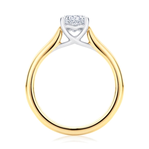 Oval diamond engagement ring yellow gold with side stones