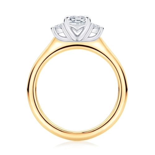 Emerald cut diamond three stone engagement ring yellow gold