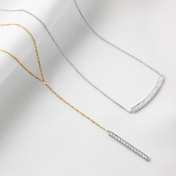 Two custom made diamond necklaces in white gold and yellow gold