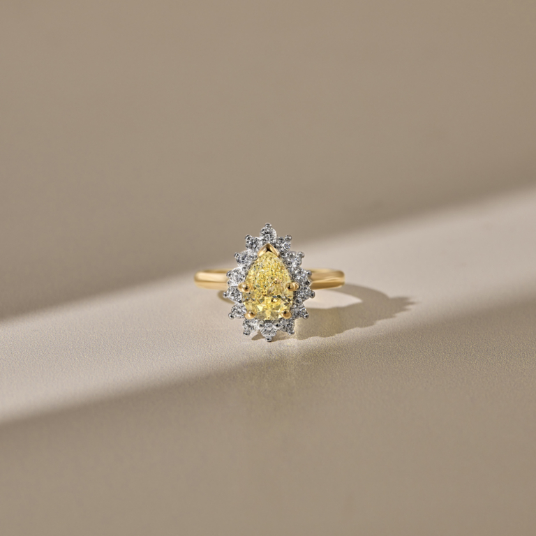 yellow diamond engagement ring with 18ct yellow gold band. customised engagement ring