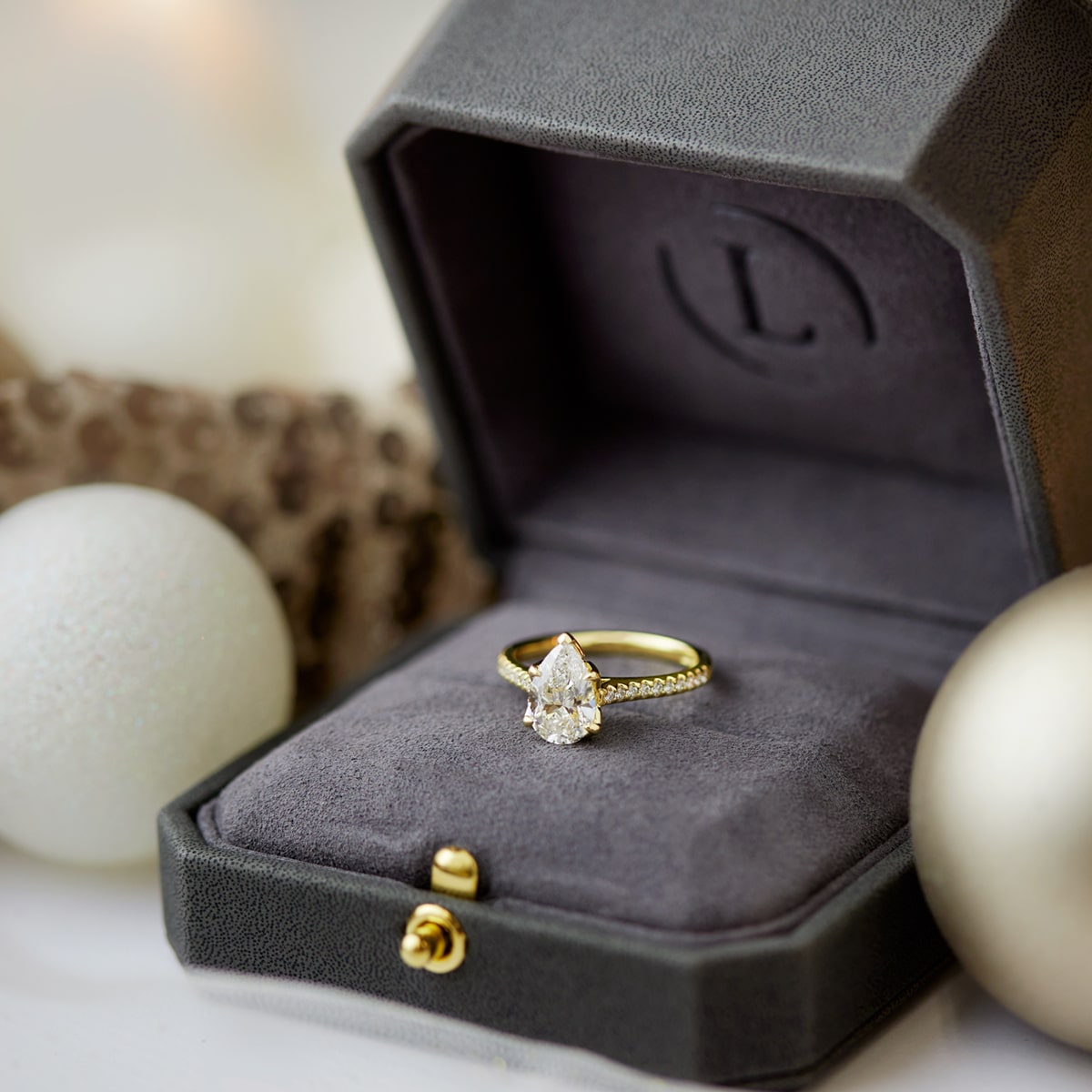 Christmas proposal yellow gold pear cut diamond engagement ring