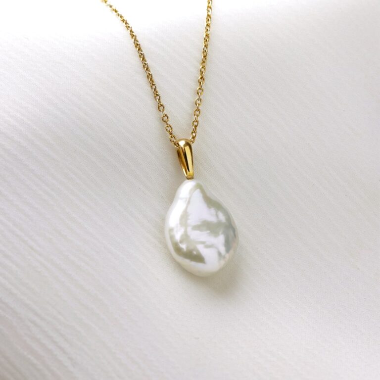 irregular freshwater pearl pendant on yellow gold chain