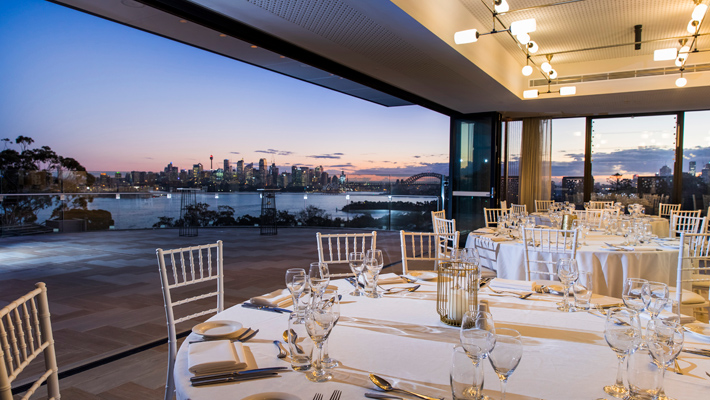 A wedding banquet at Taronga Zoo looking out onto Sydney harbour. 