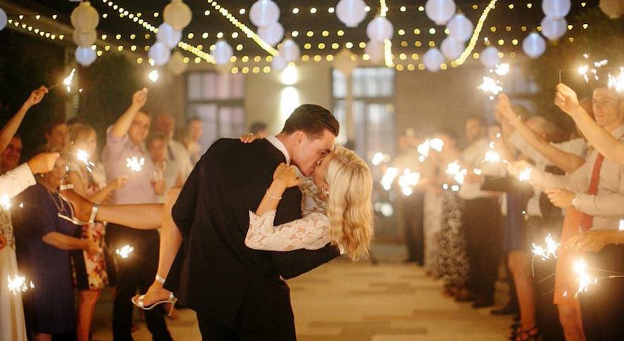 A couple entering their wedding reception at Gunner's Barracks at the venue in the Lower North Shore of Sydney.