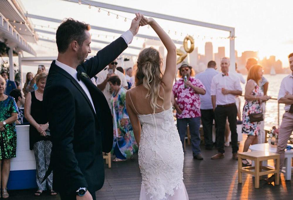 A couple having their wedding reception at The Island, floating on the Sydney harbour. 