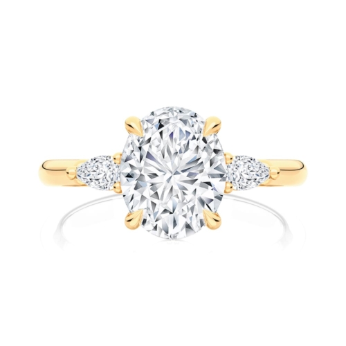 Oval Diamond Three Stone Ring in Yellow Gold | Cala