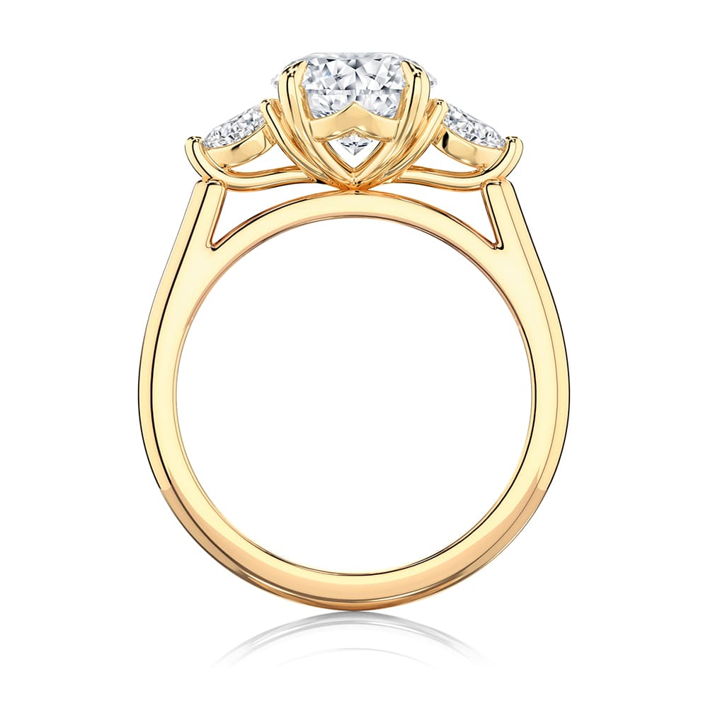 Oval Diamond Three Stone Ring in Yellow Gold | Cala
