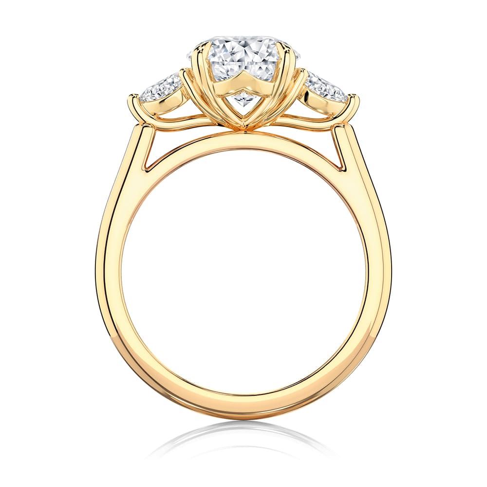 Oval Diamond Three Stone Ring in Yellow Gold | Cala