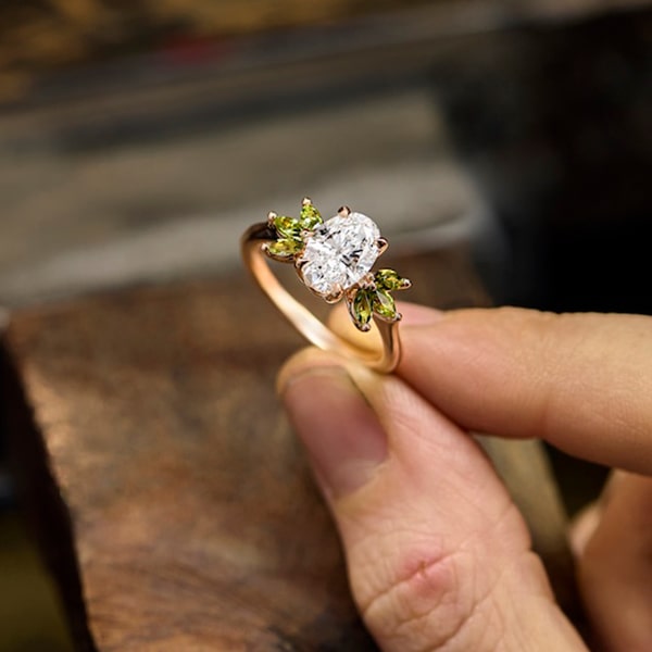 18ct Rose Gold Band with an Oval Cut Diamond and 2 Marquise Tourmaline Side Stones