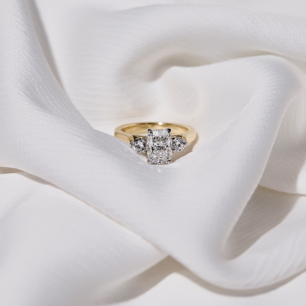 custome engagement ring. - elongated cushion cut diamond ring trilogy